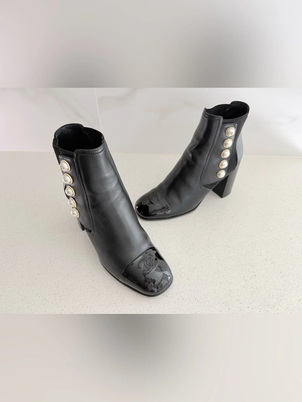 CHANEL  Coco Mark Faux-Pearl Black Leather Ankle Boots